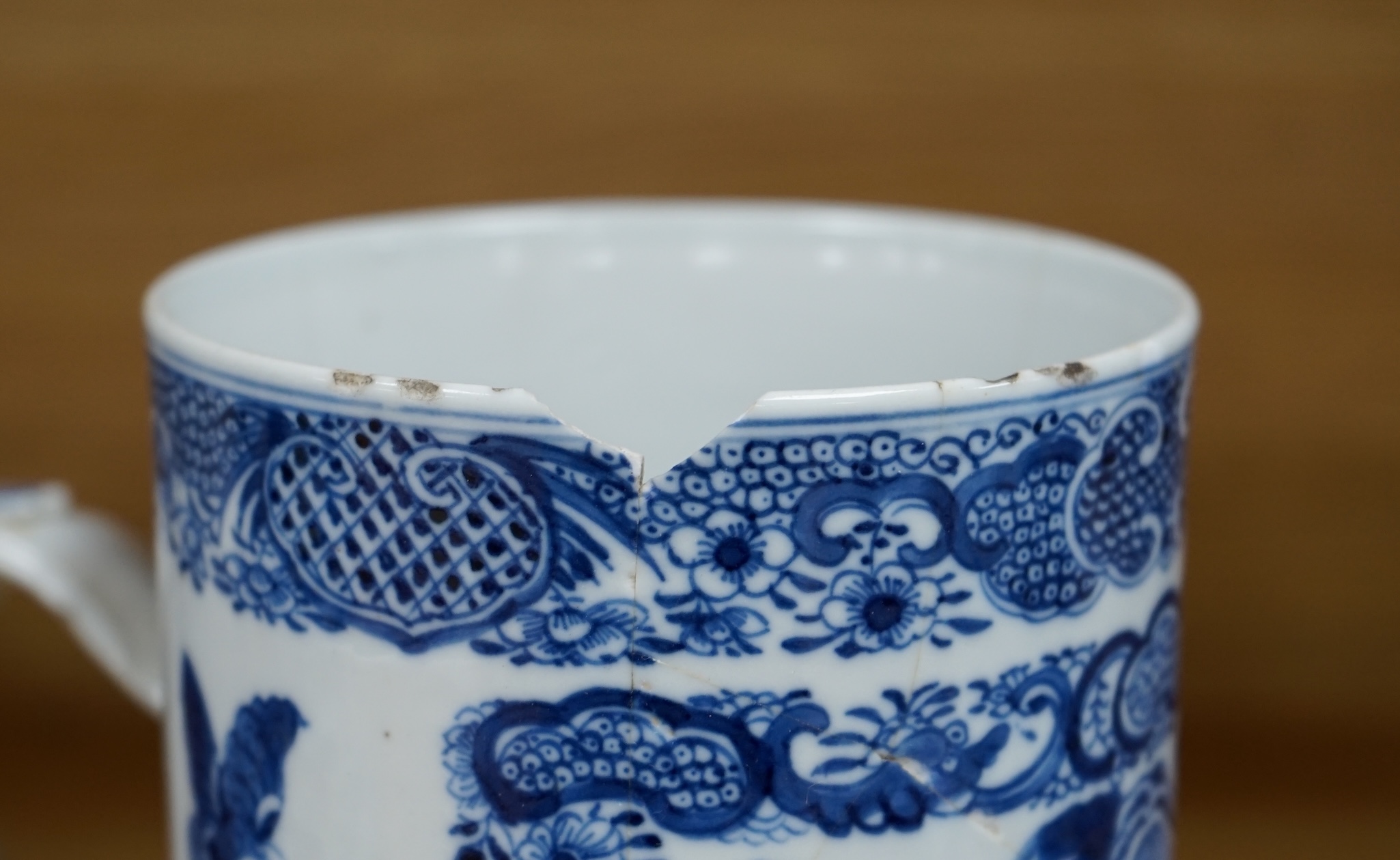 A pair of Chinese blue and white double gourd shaped vases, 19th century and a large export tankard, 18th century, largest 19cm high. Condition - poor